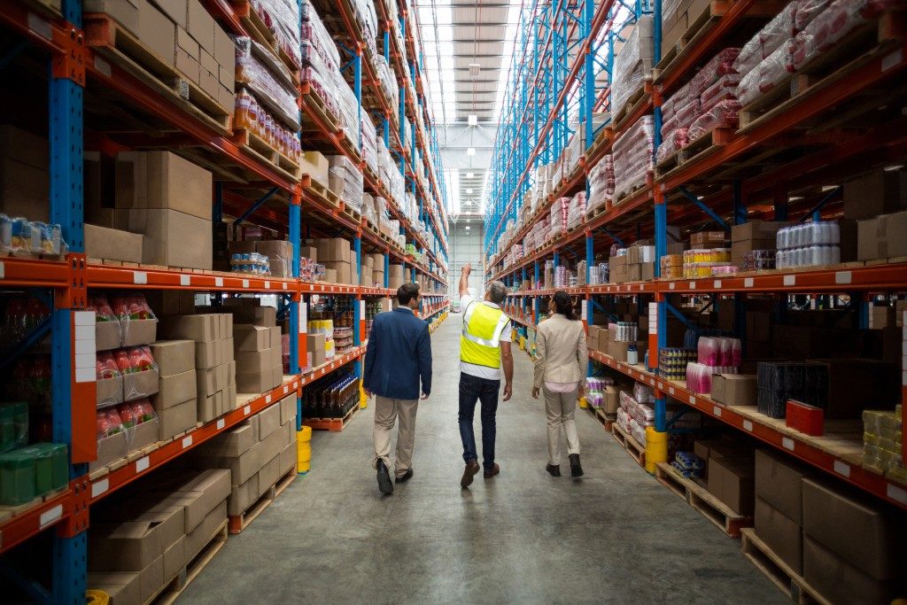 Logistics employees walking in the warehouse