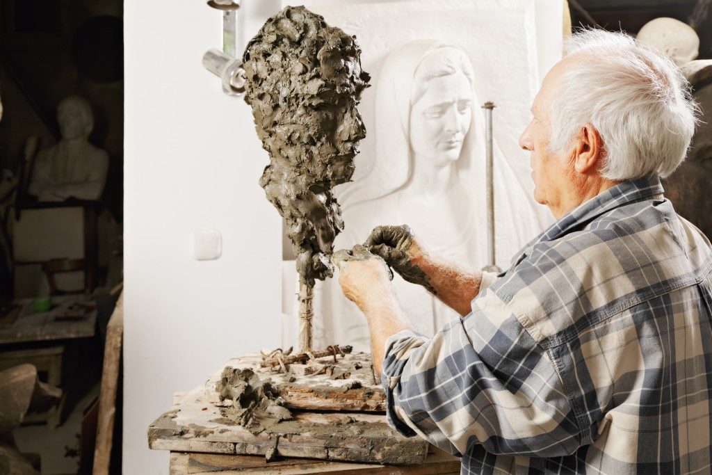 Sculptor creating a piece