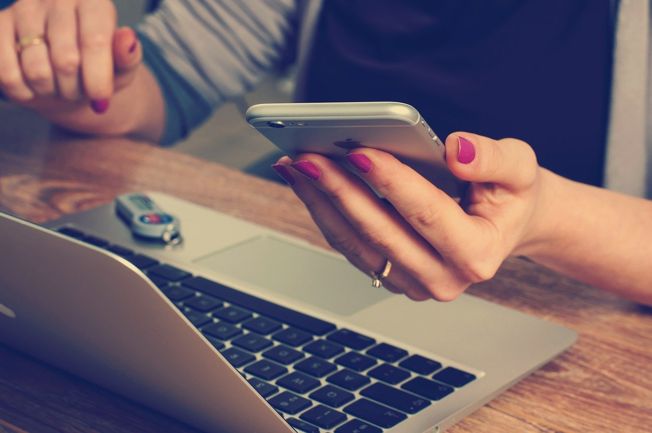 woman using her phone