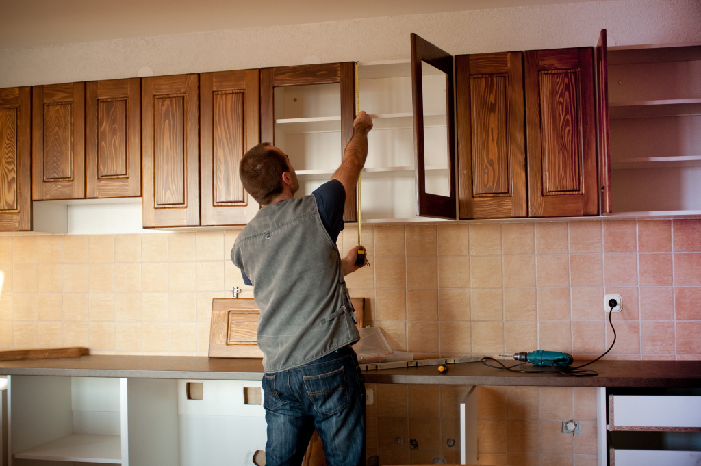 A homeowner remodeling the kitchen