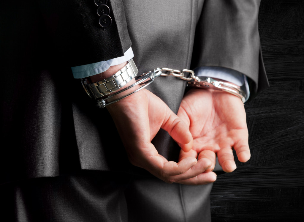 Crime man in handcuffs