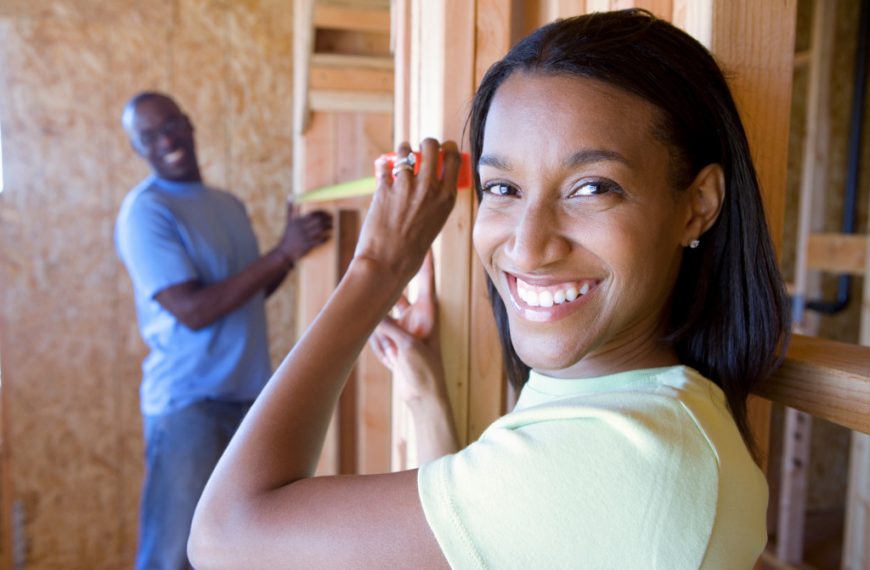 Young couple working on improving their home.